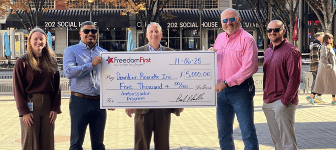 Freedom First giving $5,000 check to Downtown Roanoke Inc