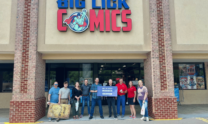 Freedom First employees participating in a cash mob at Big Lick Comics